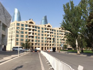 The modernized version of the Old Intourist Hotel in 2015. Rising behind are the flame towers, which host a hotel, offices and apartments.